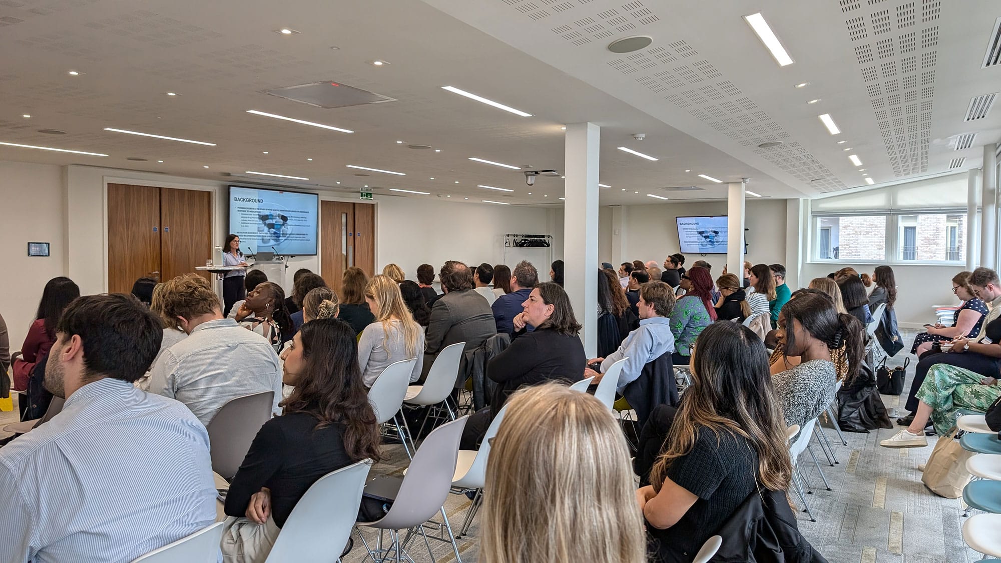 a group of audience attendees at a conference